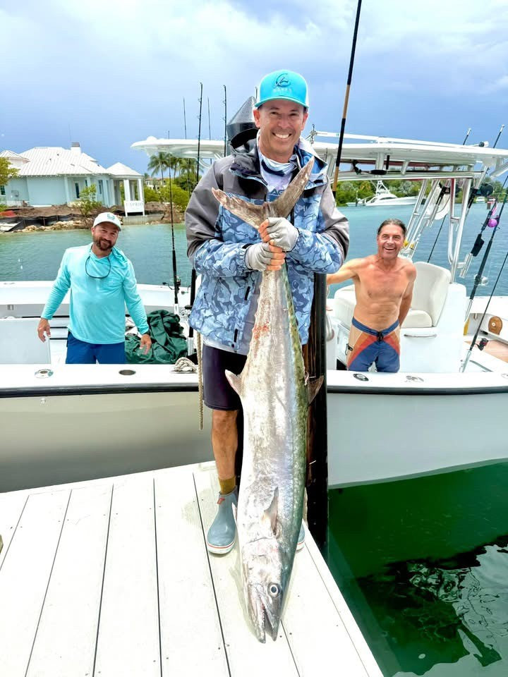 Cold water up north pushes big kings into local waters.